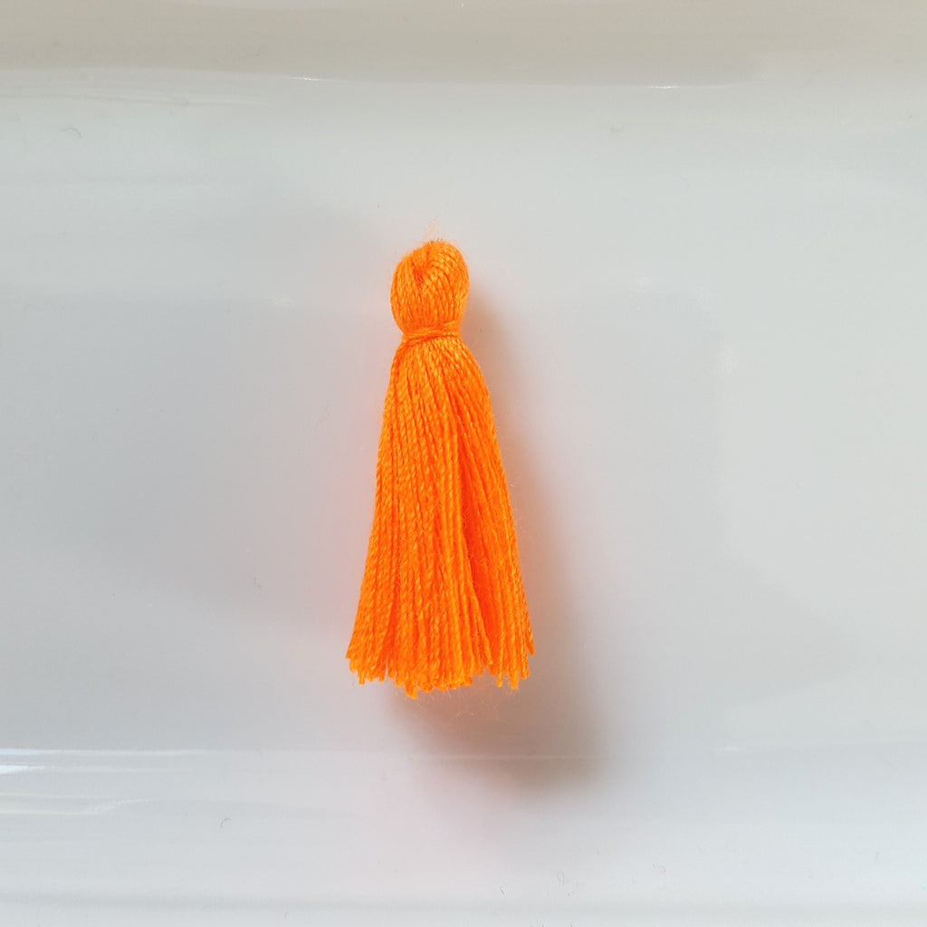 Pompon en polyamide Orange Fluo 25 mm x 1