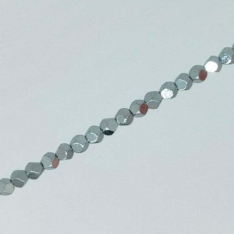 Perles en H&eacute;matite Hexagonales 3 mm x 20
